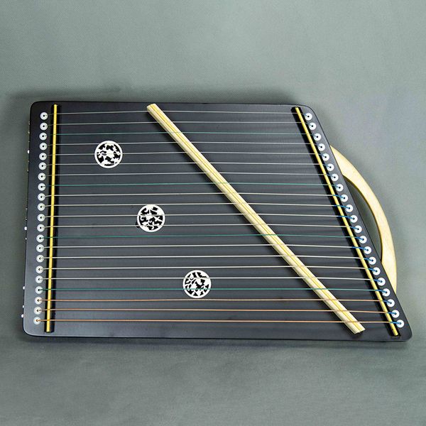traditional handcrafted mini guzheng chinese musical instrument with solid wood body
traditional handcrafted mini guzheng chinese musical instrument with solid wood body