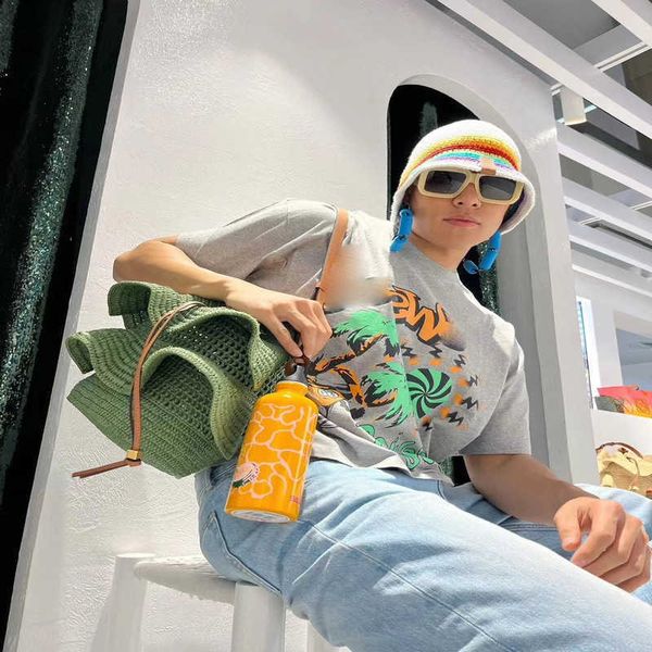 luxury designer's new men's and women's short sleeved sportswear set correct spring street luojia 23ss digital print seaside, White
luxury designer's new men's and women's short sleeved sportswear set correct spring street luojia 23ss digital print seaside, White