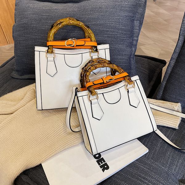 new shoulder bags for women diana bamboo handle handbag leather luxury hand bag designer evening bag purses crossbody lady tote bag wallet
new shoulder bags for women diana bamboo handle handbag leather luxury hand bag designer evening bag purses crossbody lady tote bag wallet