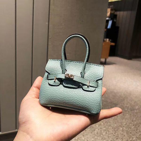 fashion designer mini purse pendant bag women's high-end brand headphone lipstick car key organizer bag classic luxury car key ring bag, Red;blue
fashion designer mini purse pendant bag women's high-end brand headphone lipstick car key organizer bag classic luxury car key ring bag, Red;blue