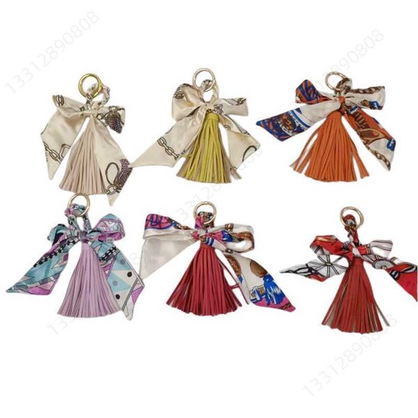 designer keychain braided rope same silk scarf tassel bag pendant fashion spike key chain car accessories keychain, Silver
designer keychain braided rope same silk scarf tassel bag pendant fashion spike key chain car accessories keychain, Silver