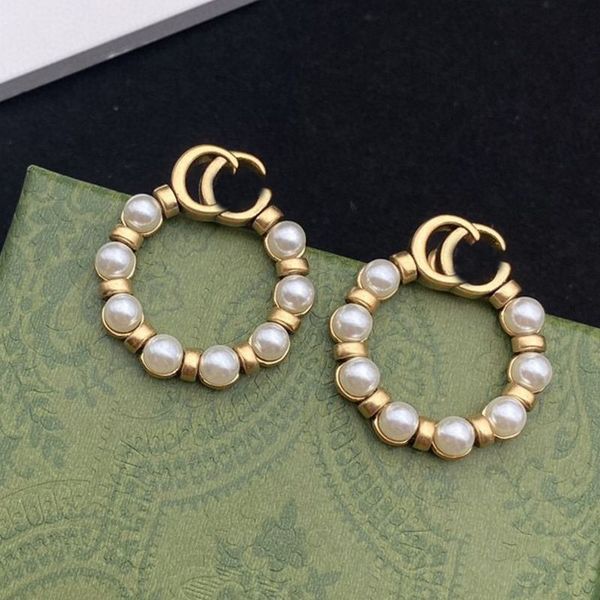 no box fashion jewelry women designer studs white pearl brass g love earring, Golden;silver
no box fashion jewelry women designer studs white pearl brass g love earring, Golden;silver