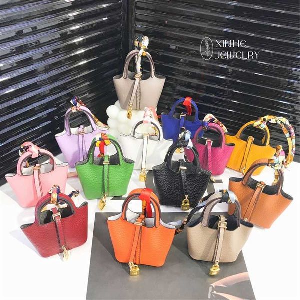 xinhe super fiber leather vegetable basket mini bag pendant headset creative car key chain
xinhe super fiber leather vegetable basket mini bag pendant headset creative car key chain