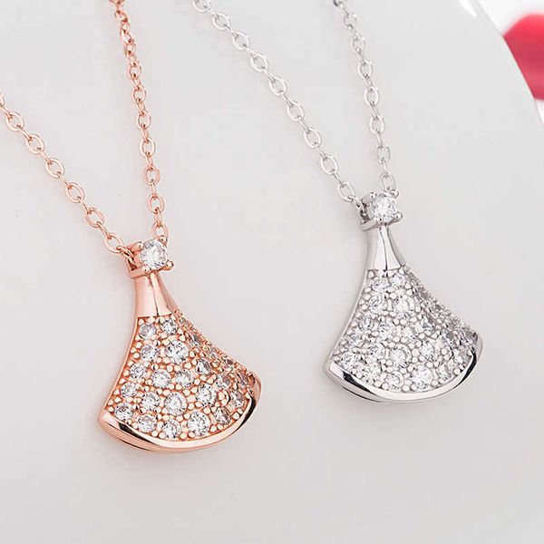 s925 sterling silver small skirt necklace original full diamond fan shaped women's tiktok kwai net red charm
s925 sterling silver small skirt necklace original full diamond fan shaped women's tiktok kwai net red charm
