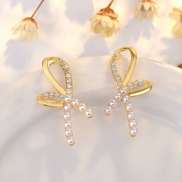 classic 925 silver needle stud bow pearl earrings for women fashion simple design jewelry, Golden;silver
classic 925 silver needle stud bow pearl earrings for women fashion simple design jewelry, Golden;silver