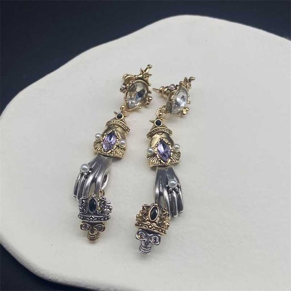 fashion design jewelry crown skull long earrings dark ghost hand high cold personality earrings female, Golden
fashion design jewelry crown skull long earrings dark ghost hand high cold personality earrings female, Golden