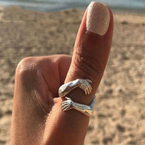 band rings classic creative silver color hug rings for women fashion metal carved hands open ring birthday party jewelry p230411
band rings classic creative silver color hug rings for women fashion metal carved hands open ring birthday party jewelry p230411