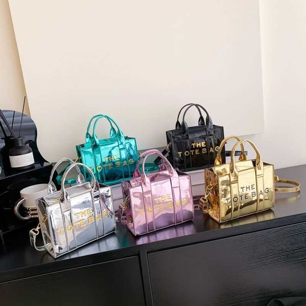 designer bag spring/summer 2023 new fashion handheld mini tote bag shiny lacquer leather letter one shoulder crossbody bag
designer bag spring/summer 2023 new fashion handheld mini tote bag shiny lacquer leather letter one shoulder crossbody bag