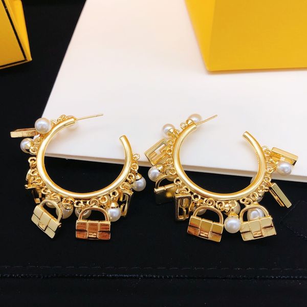 2023 fashion new designer charm earrings luxury gold pearl bag type pendant earrings fashion exquisite gift women's party birthday gift, Golden
2023 fashion new designer charm earrings luxury gold pearl bag type pendant earrings fashion exquisite gift women's party birthday gift, Golden