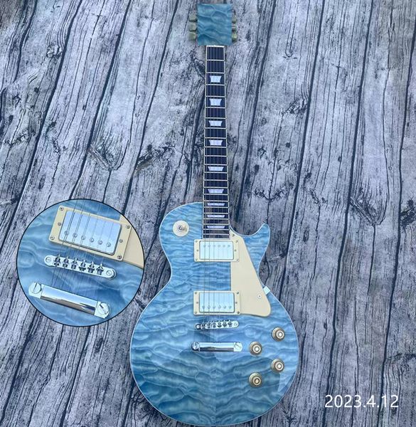 electric guitar blue quilt flame on body and headstock chrome parts hh pickups cream pickguard
electric guitar blue quilt flame on body and headstock chrome parts hh pickups cream pickguard