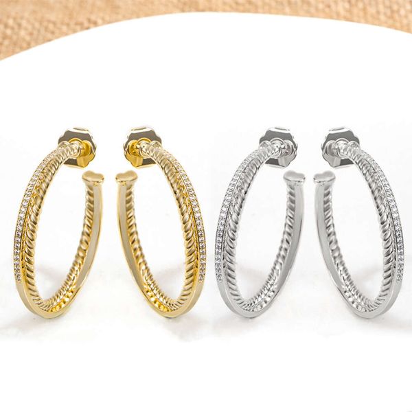 Classic DY earrings jewelry designer top fashion accessories popular circular cable button wire inlaid with zircon diamond large earrings classic DY accessories
Classic DY earrings jewelry designer top fashion accessories popular circular cable button wire inlaid with zircon diamond large earrings classic DY accessories