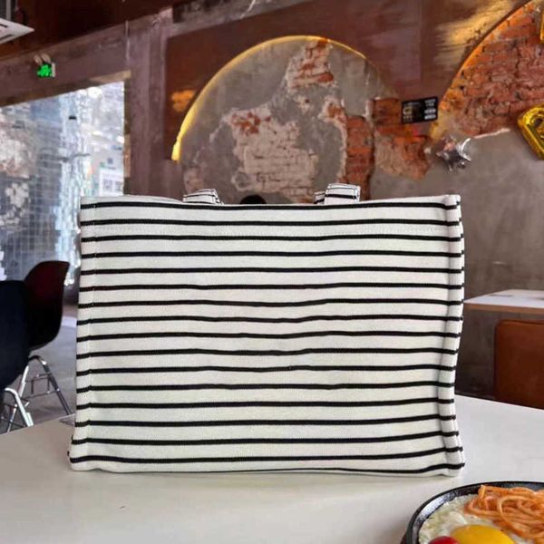 totes large capacity canvas stripe tote bag women handbag shopping bags designer handbags messengers crossbody bag purses 220804/0920
totes large capacity canvas stripe tote bag women handbag shopping bags designer handbags messengers crossbody bag purses 220804/0920