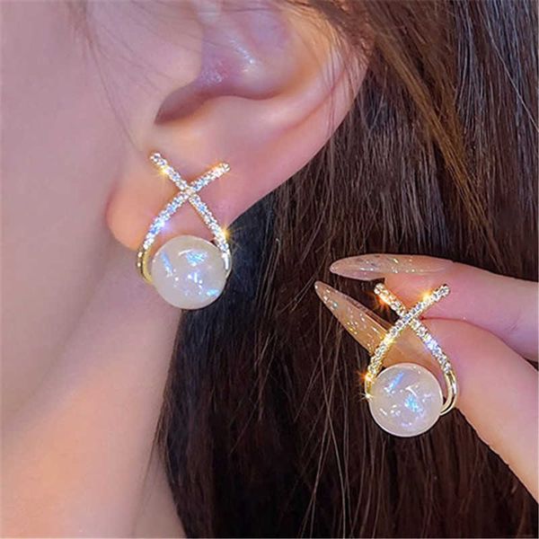 stud modyle korean fashion gold color pearl stud earrings for women white cubic zirconia cross wedding jewelry gifts p230411, Golden;silver
stud modyle korean fashion gold color pearl stud earrings for women white cubic zirconia cross wedding jewelry gifts p230411, Golden;silver