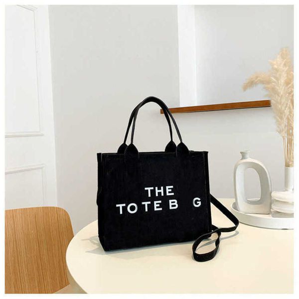 totes marc large capacity shoulder the casual bag letter print advanced texture handbag fashion trend shopping messenger wallets 1014
totes marc large capacity shoulder the casual bag letter print advanced texture handbag fashion trend shopping messenger wallets 1014