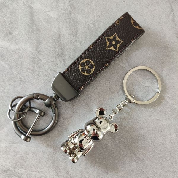 keychain designer key chain mens car keyring womens fashion black bear buckle silver bear keychains handmade leather men women bags pendant
keychain designer key chain mens car keyring womens fashion black bear buckle silver bear keychains handmade leather men women bags pendant