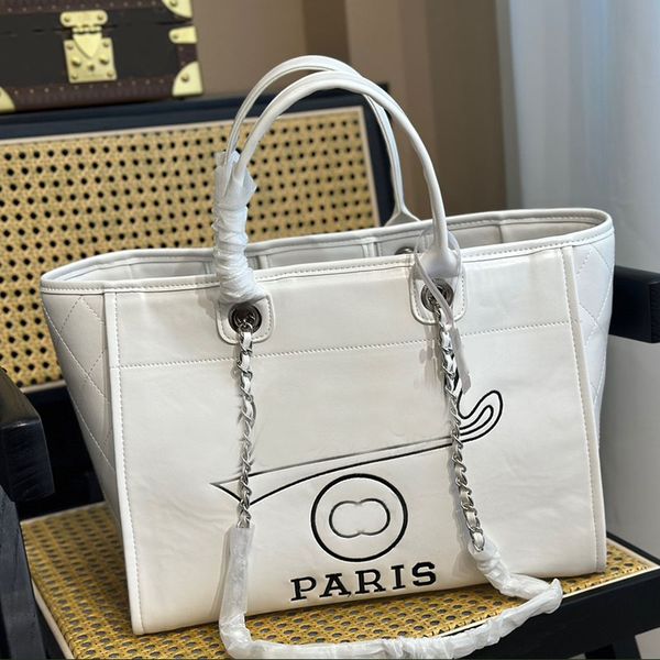 woman designer beach shopping bag quilted with handle genuine leather embroidery letter large capacity matelasse chain shoulder handbag outd
woman designer beach shopping bag quilted with handle genuine leather embroidery letter large capacity matelasse chain shoulder handbag outd