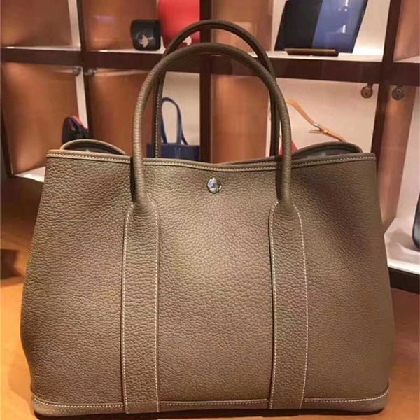 luxury designer herms garden totes handbags 30cm/36cm discount direct mail party full leather bag 30/36 handheld bag women's bag
luxury designer herms garden totes handbags 30cm/36cm discount direct mail party full leather bag 30/36 handheld bag women's bag