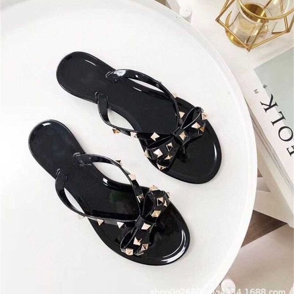 spring and summer new rivet bow beach flat sandals women pvc jelly shoes herringbone slippers, Black
spring and summer new rivet bow beach flat sandals women pvc jelly shoes herringbone slippers, Black