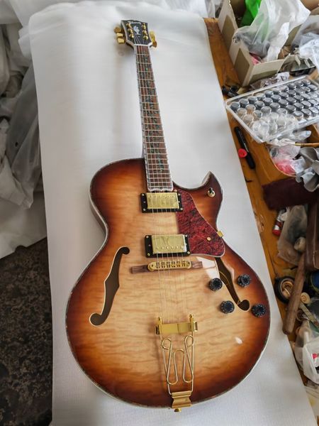 custom es175 honey sunburst quilt maple electric guitar semi hollow body tree of life inlay gold hardware
custom es175 honey sunburst quilt maple electric guitar semi hollow body tree of life inlay gold hardware