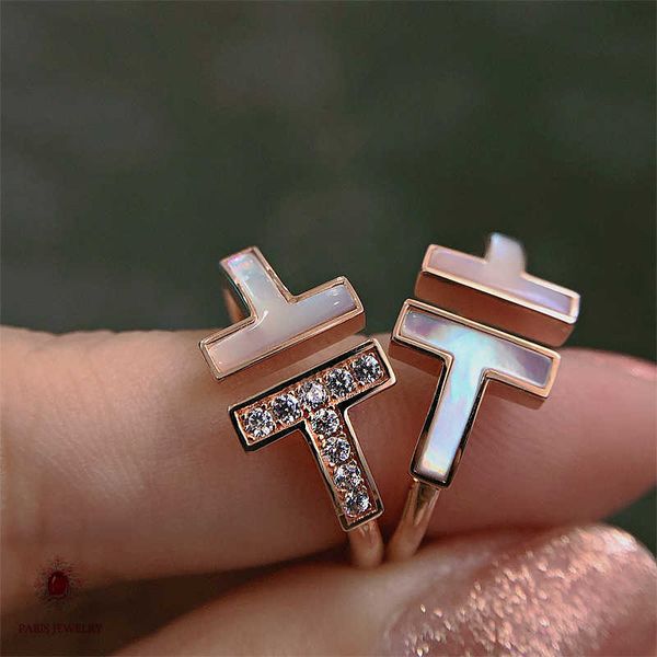 boutique tjia tiffay double t ring sterling silver 925 white shell with diamond for men and women
boutique tjia tiffay double t ring sterling silver 925 white shell with diamond for men and women