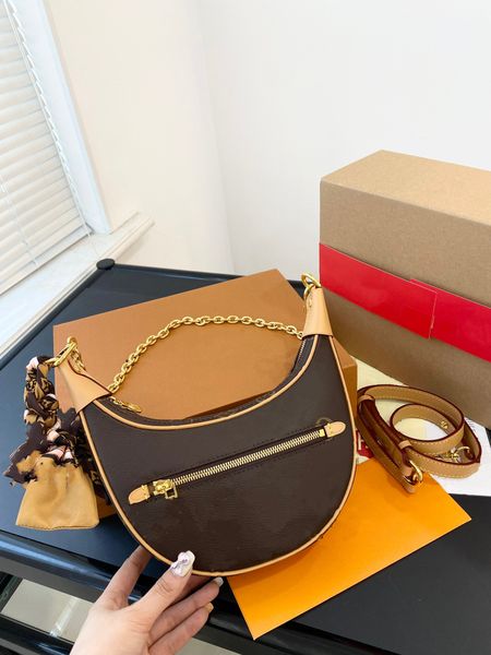 2023 designer ring bag croissant shoulder tramp designer purse half moon luxury women's long stick underarm handbag crossbody bag metal
2023 designer ring bag croissant shoulder tramp designer purse half moon luxury women's long stick underarm handbag crossbody bag metal