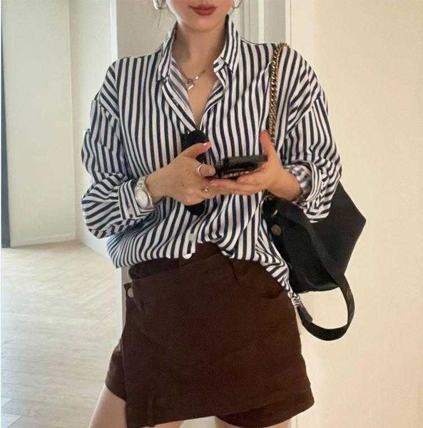 minimalist design vertical striped shirt summer hong kong style loose slimming, White
minimalist design vertical striped shirt summer hong kong style loose slimming, White
