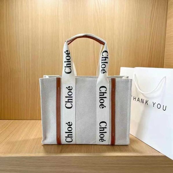 luxurys designers totes woody beach shopping bag womens shoulder duffel mens wallet canvas large lady bags pochette linen crossbody
luxurys designers totes woody beach shopping bag womens shoulder duffel mens wallet canvas large lady bags pochette linen crossbody