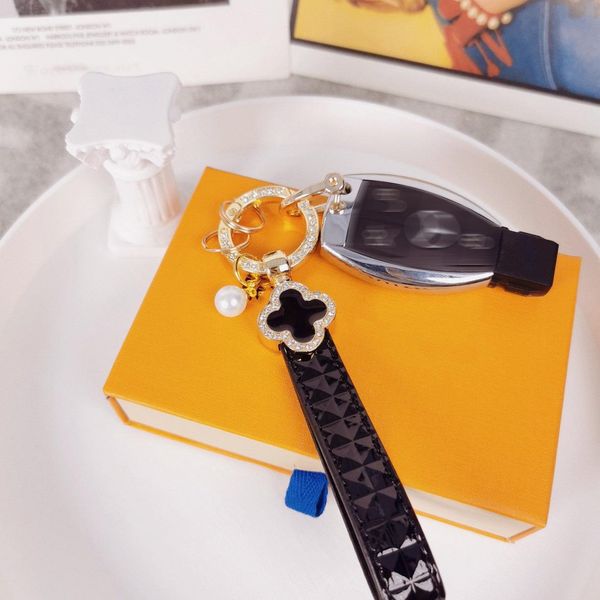 designer keychain for womens wallet pendant 24k gold-plated leather four-leaf clover with diamond belt pearl car keychain festive gift ring, Silver
designer keychain for womens wallet pendant 24k gold-plated leather four-leaf clover with diamond belt pearl car keychain festive gift ring, Silver