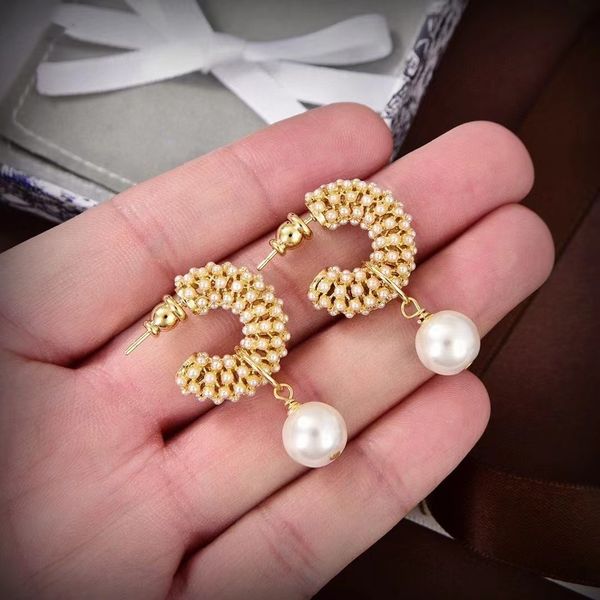 charm gold size double pearl designer earrings new pearl hollowed out women's earrings, Golden
charm gold size double pearl designer earrings new pearl hollowed out women's earrings, Golden