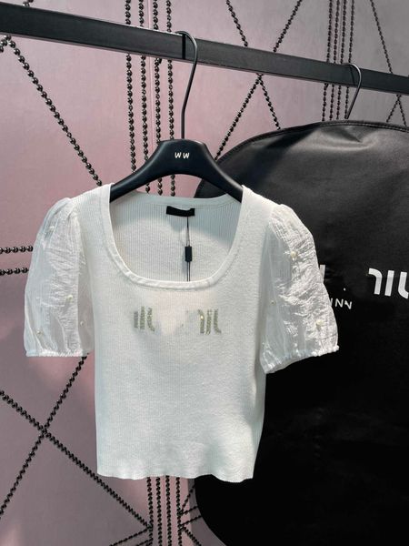 23ss womens designer clothing womens knits ironing drill logo spell sleeve pearl knitted slimming and slimming womens clothes, White
23ss womens designer clothing womens knits ironing drill logo spell sleeve pearl knitted slimming and slimming womens clothes, White