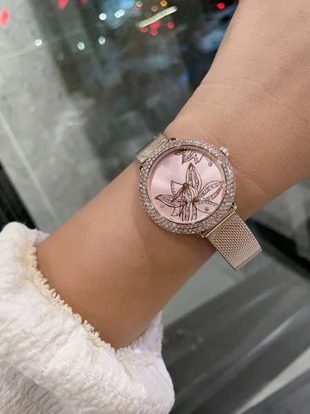 new fashionable women's watch crystal inlaid dial match with swiss quartz movement size34.5mm, Slivery;brown
new fashionable women's watch crystal inlaid dial match with swiss quartz movement size34.5mm, Slivery;brown