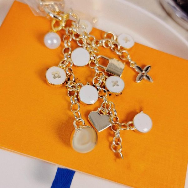 luxury designer keychain womens gold-plated letter love money belt pearl wallet chain exquisite packaging girlfriend holiday gift, Silver
luxury designer keychain womens gold-plated letter love money belt pearl wallet chain exquisite packaging girlfriend holiday gift, Silver