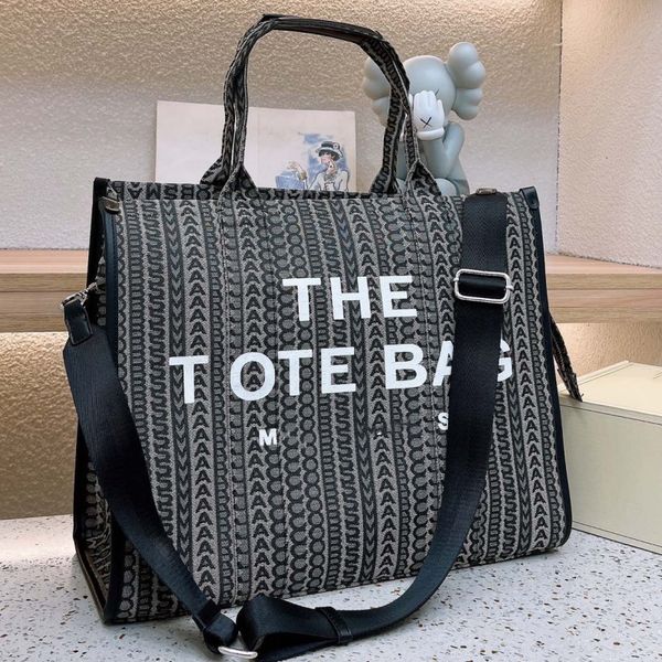 2023 new designer tote bag letter one shoulder crossbody handheld old flower jacquard mini contrast canvas solid color high capacity women&#
2023 new designer tote bag letter one shoulder crossbody handheld old flower jacquard mini contrast canvas solid color high capacity women&#