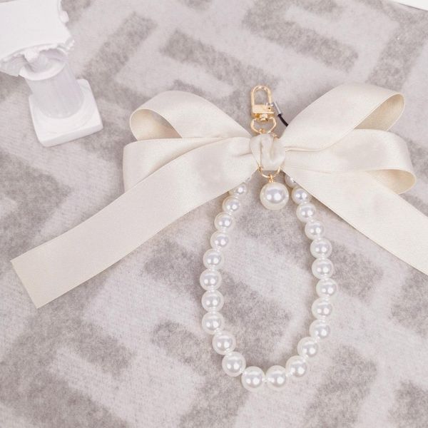 designer luxury high-quality keychain for womens golden cute bowknot pearl bracelet flower pattern wallet ornament trend creative key ring, Silver
designer luxury high-quality keychain for womens golden cute bowknot pearl bracelet flower pattern wallet ornament trend creative key ring, Silver