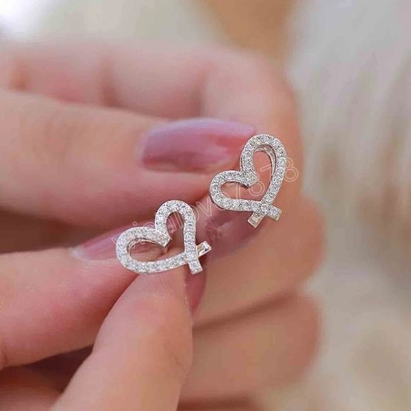 small heart stud earrings with crystal cz for women silver color hollow out love earrings fashion jewelry nice gift, Golden;silver
small heart stud earrings with crystal cz for women silver color hollow out love earrings fashion jewelry nice gift, Golden;silver