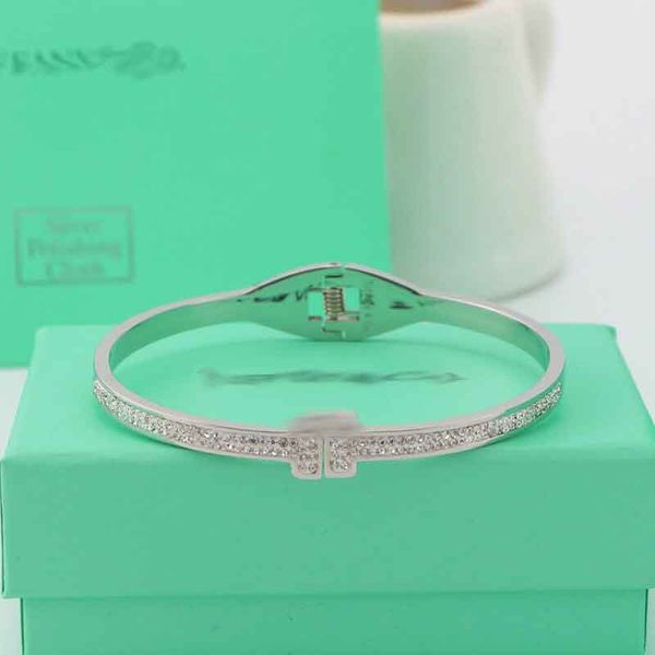 10 years factory wholesale stainless steel t-shaped full-drilled open bracelet suitable for couples gifts with dust bags, Silver
10 years factory wholesale stainless steel t-shaped full-drilled open bracelet suitable for couples gifts with dust bags, Silver