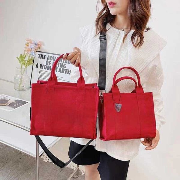 2022 handbag female luxury designer bag canvas practical large capacity ordinary coin wallet square wallet, Red;black 
2022 handbag female luxury designer bag canvas practical large capacity ordinary coin wallet square wallet, Red;black