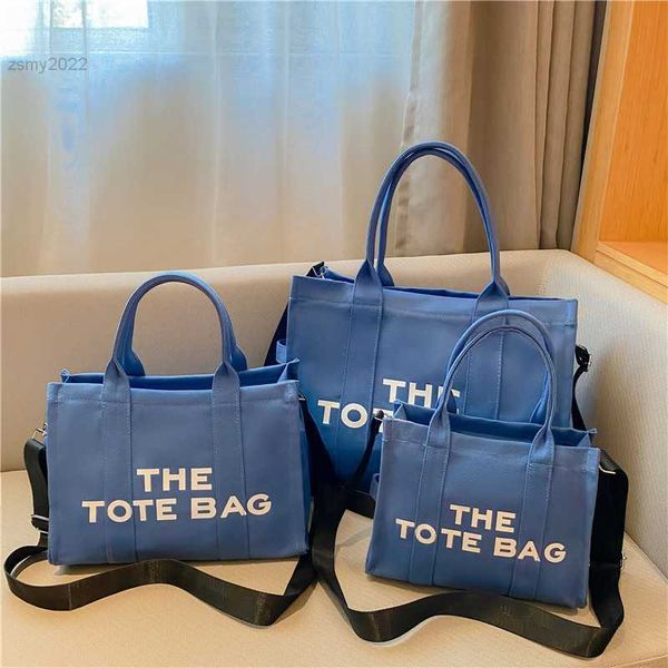 totes designer woman canvas tote large capacity letter female handbag casual ladies shoulder messenger bag luxury big shopping purses
totes designer woman canvas tote large capacity letter female handbag casual ladies shoulder messenger bag luxury big shopping purses