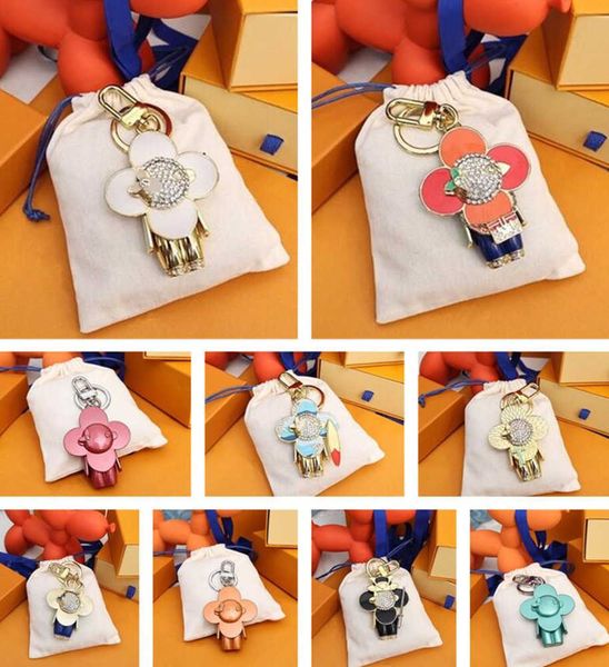 keychains lanyards keychain classic luxury designer sunflower key chain men car keyring women buckle bags pendant exquisite gift with box 82, Silver
keychains lanyards keychain classic luxury designer sunflower key chain men car keyring women buckle bags pendant exquisite gift with box 82, Silver