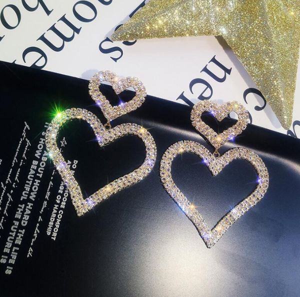 925 silver dangle versatile european and american fashion chain hollow full diamond double love earrings long peach heart drop earrings
925 silver dangle versatile european and american fashion chain hollow full diamond double love earrings long peach heart drop earrings