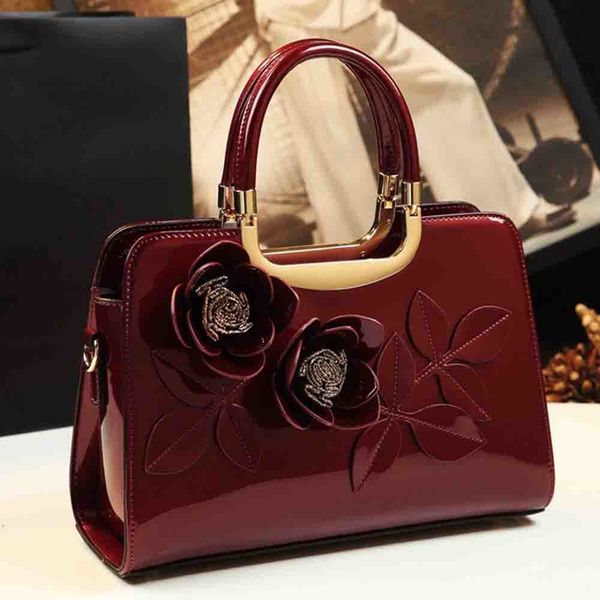 evening bags fashionable patent leather tote bag for women handle flower appliques chic madam dinner party purse 230417
evening bags fashionable patent leather tote bag for women handle flower appliques chic madam dinner party purse 230417