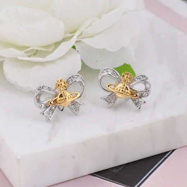 Designer earrings Western Empress Dowager Thread Bow Tie Saturn viviene westwood Earrings Female Vivian Fresh and Sweet Saturn Earrings
Designer earrings Western Empress Dowager Thread Bow Tie Saturn viviene westwood Earrings Female Vivian Fresh and Sweet Saturn Earrings