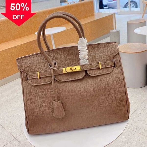 luxury brand bag for women totes trend birkins casual handbags temperament commuter lady shoulder bag female cross body bags blacka
luxury brand bag for women totes trend birkins casual handbags temperament commuter lady shoulder bag female cross body bags blacka