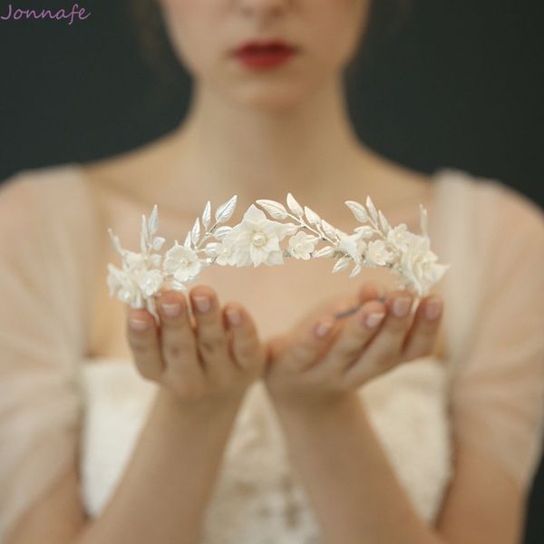fashion porcelain flower wedding crown bridal hair tiara silver color leaf headpiece women party prom accessories hair jewelry
fashion porcelain flower wedding crown bridal hair tiara silver color leaf headpiece women party prom accessories hair jewelry