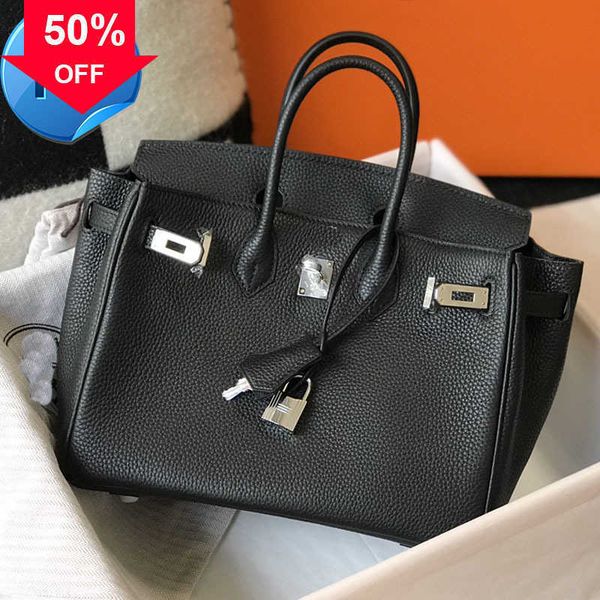 25/30/35cm tote bag large handbag women shoulder bags shopping cowhide grain genuine leather silver stamped lock fashion letter birkin handb 
25/30/35cm tote bag large handbag women shoulder bags shopping cowhide grain genuine leather silver stamped lock fashion letter birkin handb
