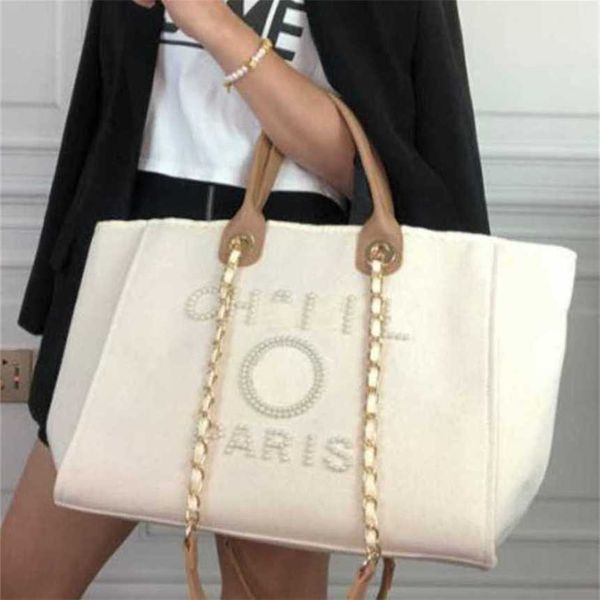 50% off luxury women's classic canvas beach bag large capacity small chain packs big shopping handbags x1l9
50% off luxury women's classic canvas beach bag large capacity small chain packs big shopping handbags x1l9