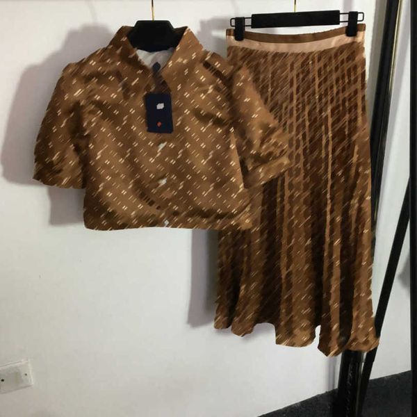 23ss skirt set shirt suit womens designer clothing presbytery logo print short sleeve shirt lotus leaf swing high waist pleated half skirt s, White
23ss skirt set shirt suit womens designer clothing presbytery logo print short sleeve shirt lotus leaf swing high waist pleated half skirt s, White