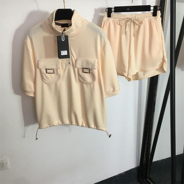 women's two piece pants for summer two-piece set new double pocket metal decorative short sleeve shorts suit casual elastic waist short, White
women's two piece pants for summer two-piece set new double pocket metal decorative short sleeve shorts suit casual elastic waist short, White