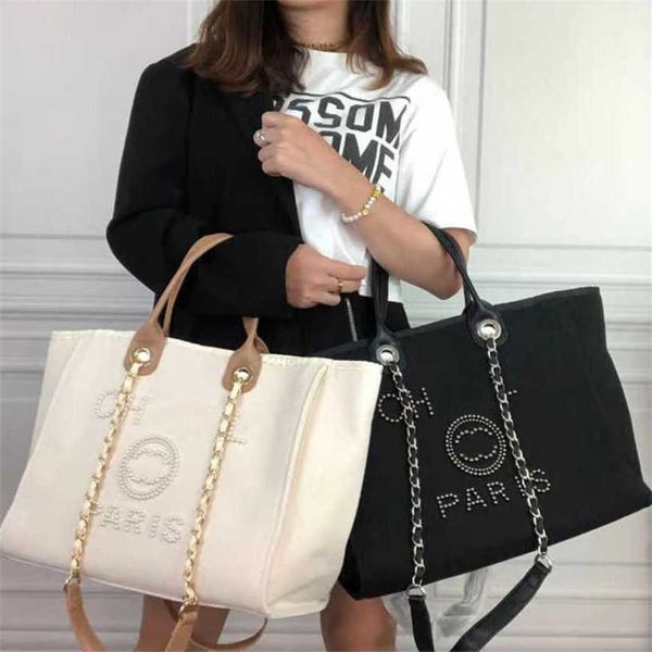 80% off women's luxury handbags pearl tote canvas beach bag designers female portable shoulder large capacity big backpack j834
80% off women's luxury handbags pearl tote canvas beach bag designers female portable shoulder large capacity big backpack j834