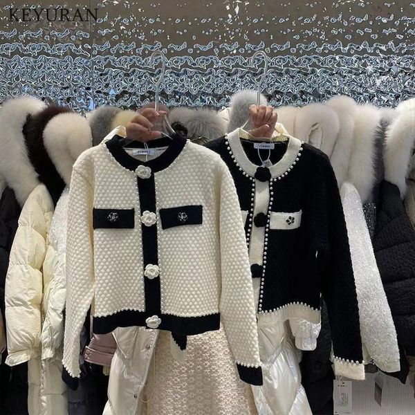 sweaters 2022 new autumn white knitted cardigans sweater women korean fashion rose flower pears beading long sleeve oneck sweaters coat, White;black
sweaters 2022 new autumn white knitted cardigans sweater women korean fashion rose flower pears beading long sleeve oneck sweaters coat, White;black